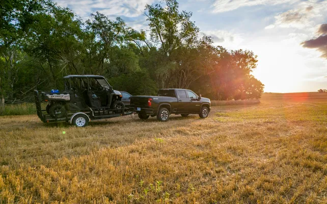 A truck on land in the midwest that is owned by a land sales specialist